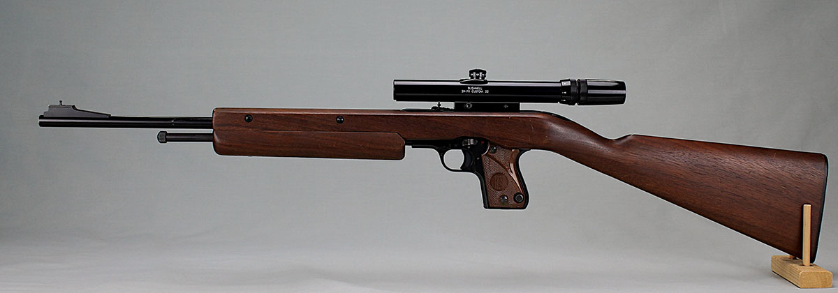 A metal action cover plate attached to the stock is grooved to accept tip-off rings or mount for a scope. Here, the FI Combo wears a period Bushnell 3X-7X Custom .22 scope.